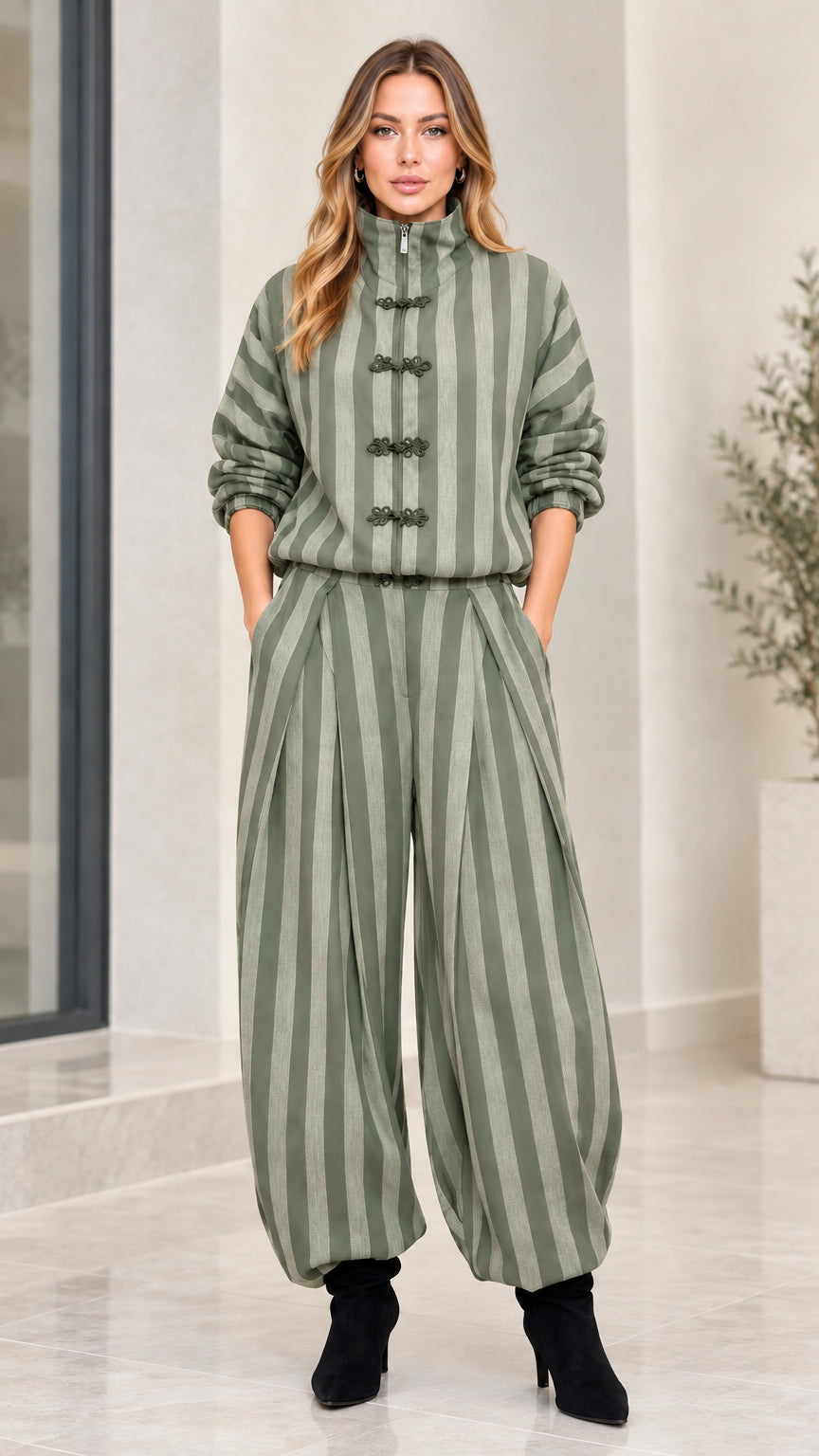 Model wearing sage olive green striped two-piece pant set
