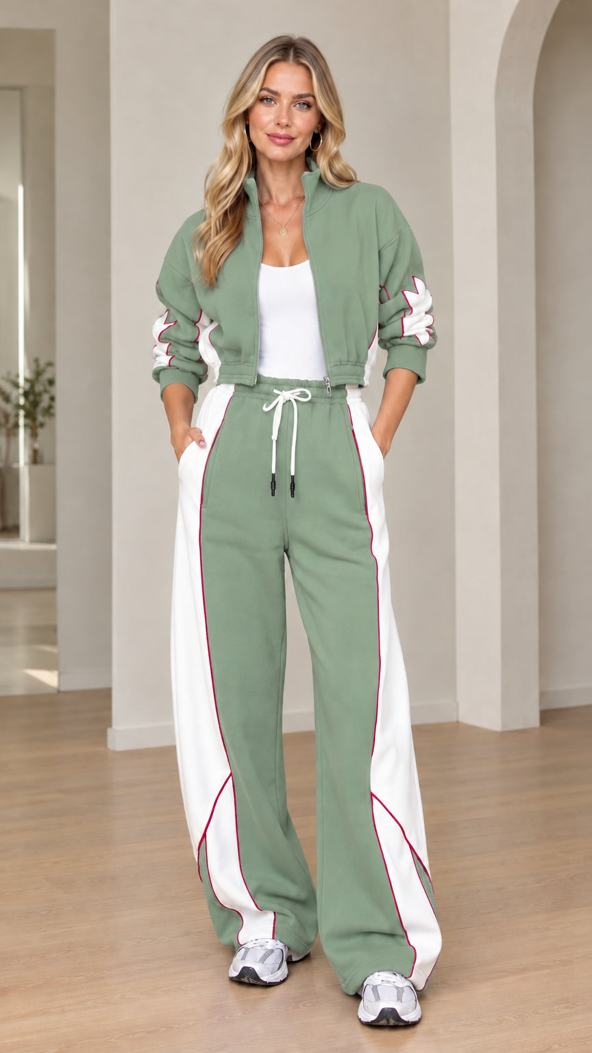 Model wearing sage green and white wide-leg sweatpants and cropped jacket set