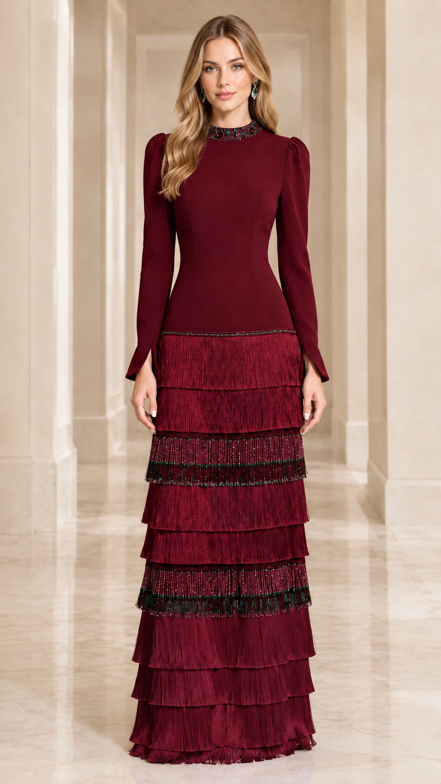 Front view of model wearing Burgundy tiered fringe long sleeve maxi gown