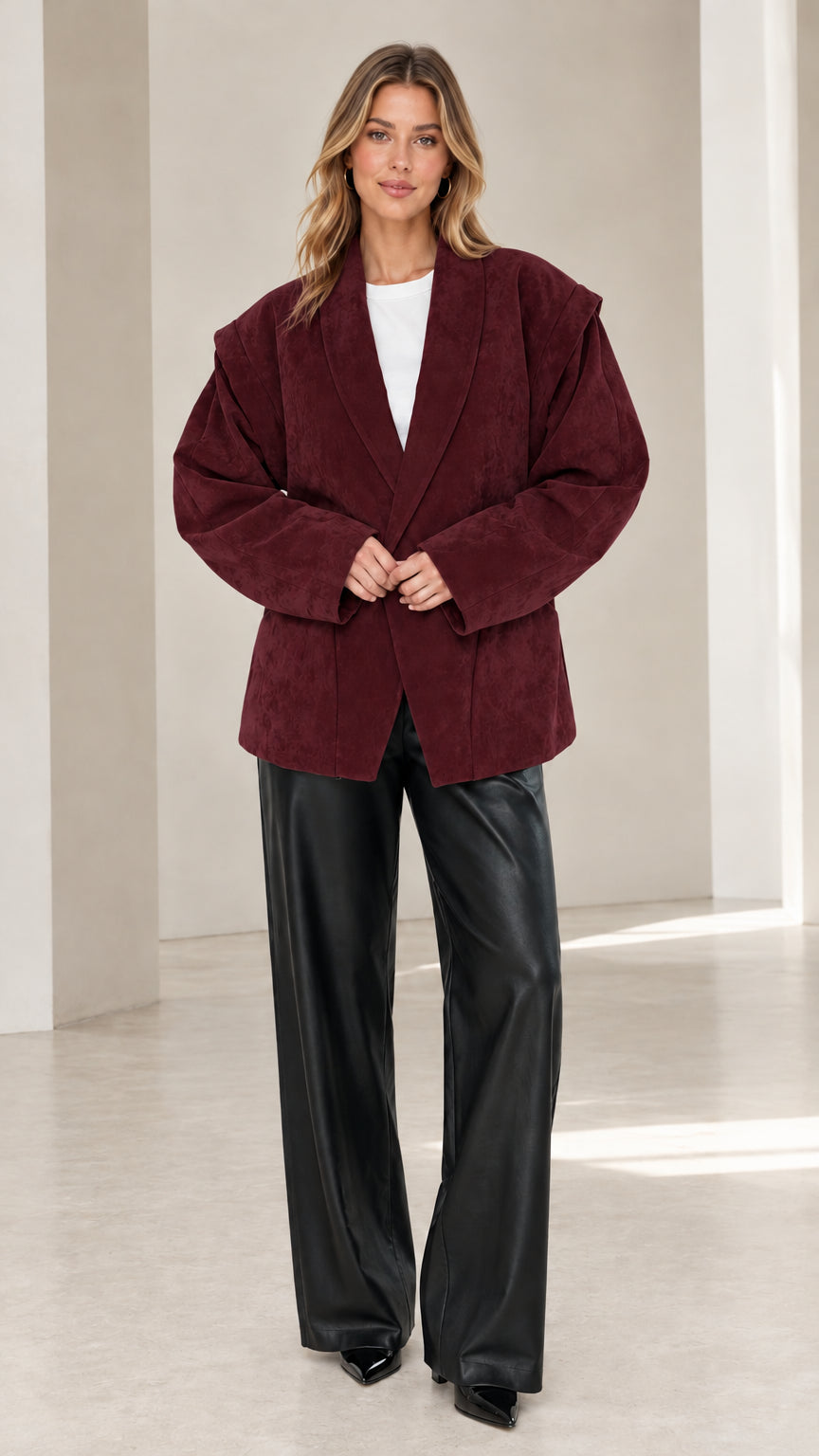 Front view of model wearing burgundy wine faux suede oversized tailored blazer