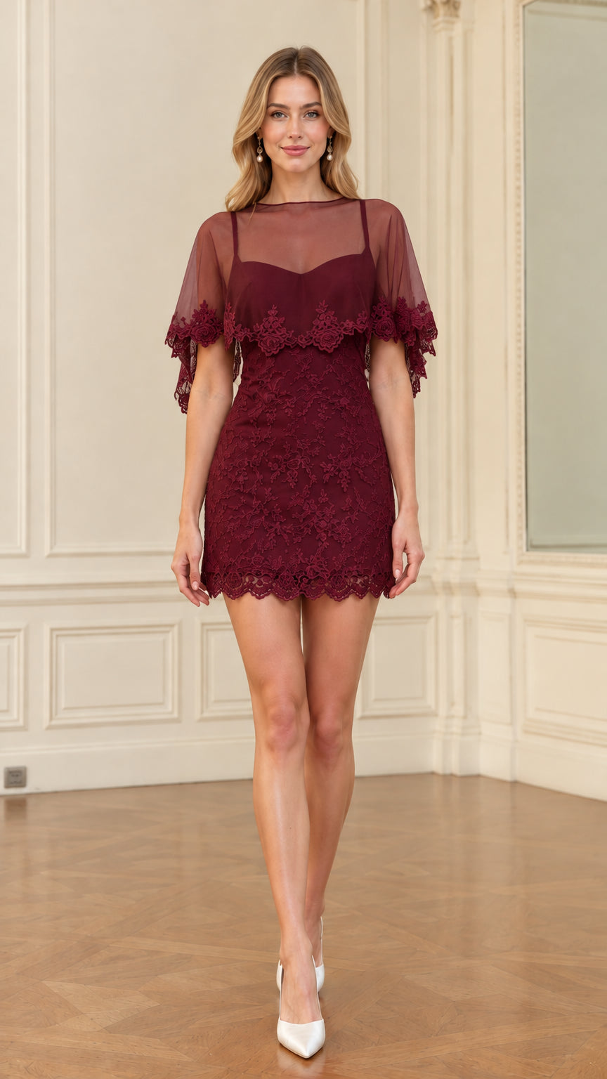 Front full-length view of burgundy wine red lace capelet mini dress