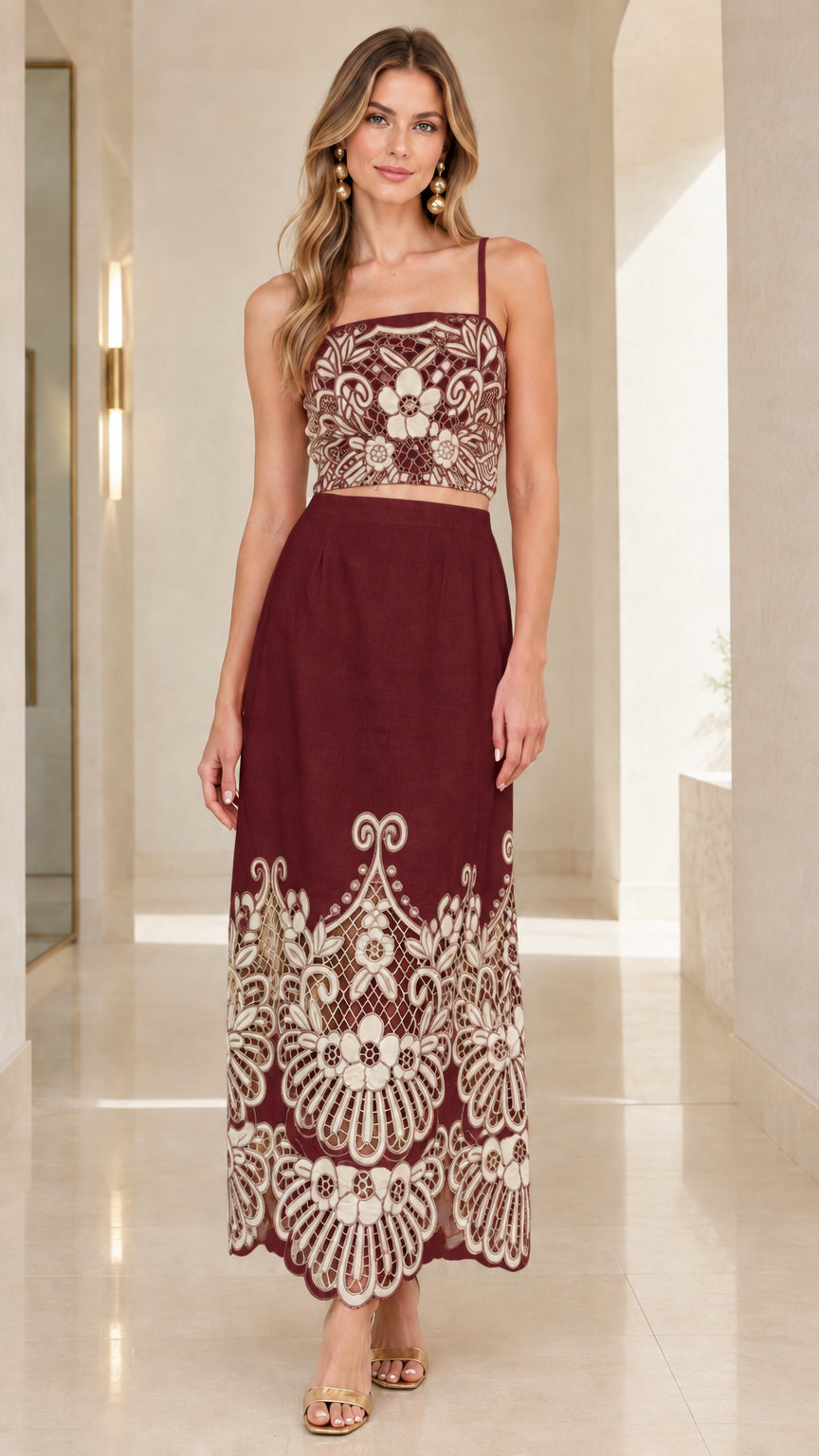 Burgundy two-piece embroidered crop top and cutout maxi skirt set
