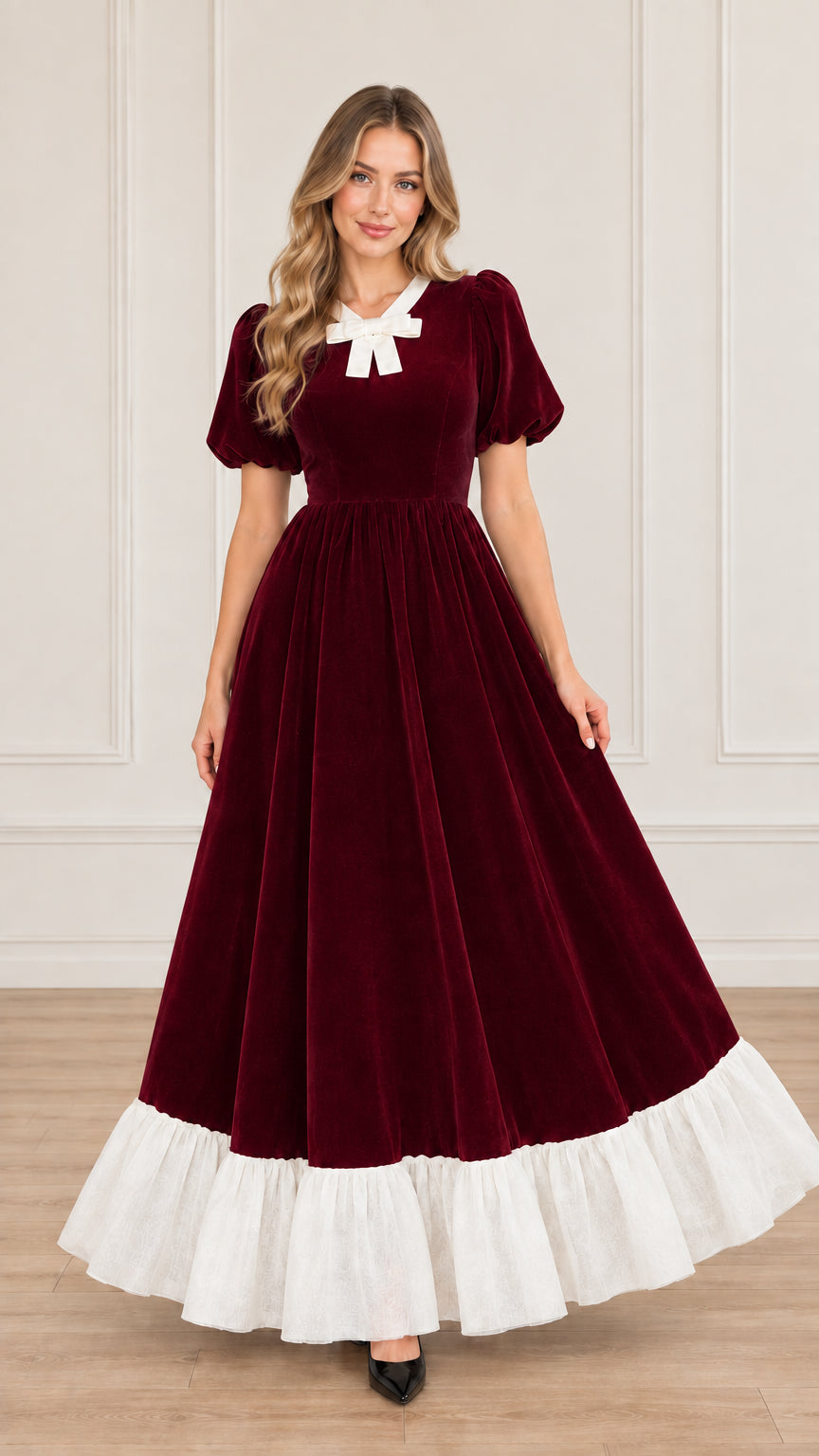 Front view of burgundy red velvet maxi dress with contrast white bow collar and hem