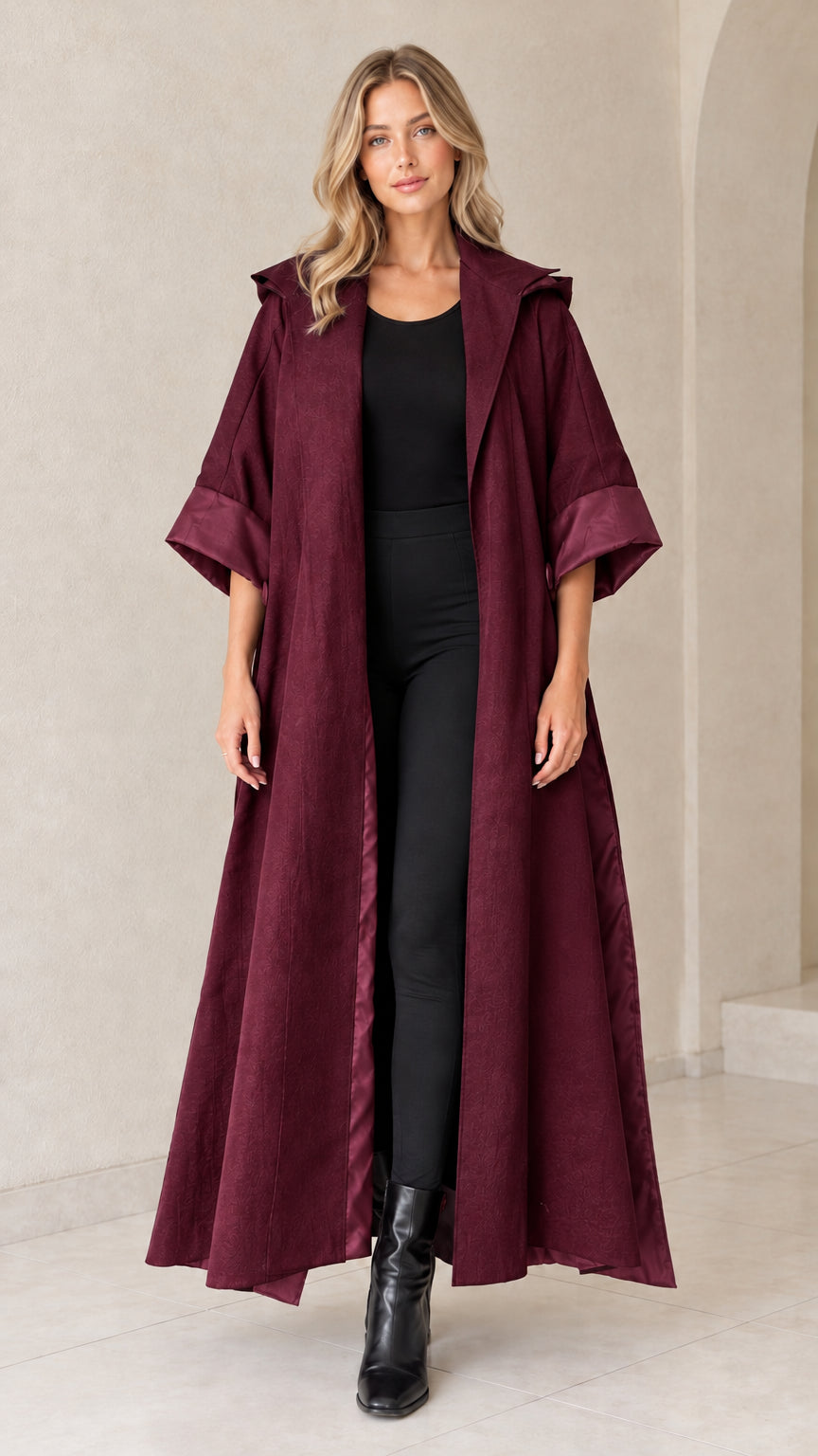 Front view of burgundy hooded maxi duster coat