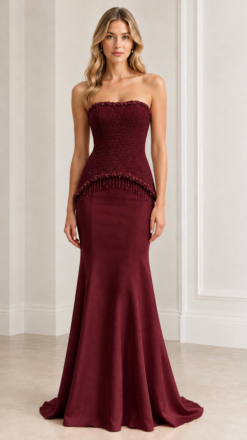 Full-length front view of the strapless tweed corset gown in Burgundy