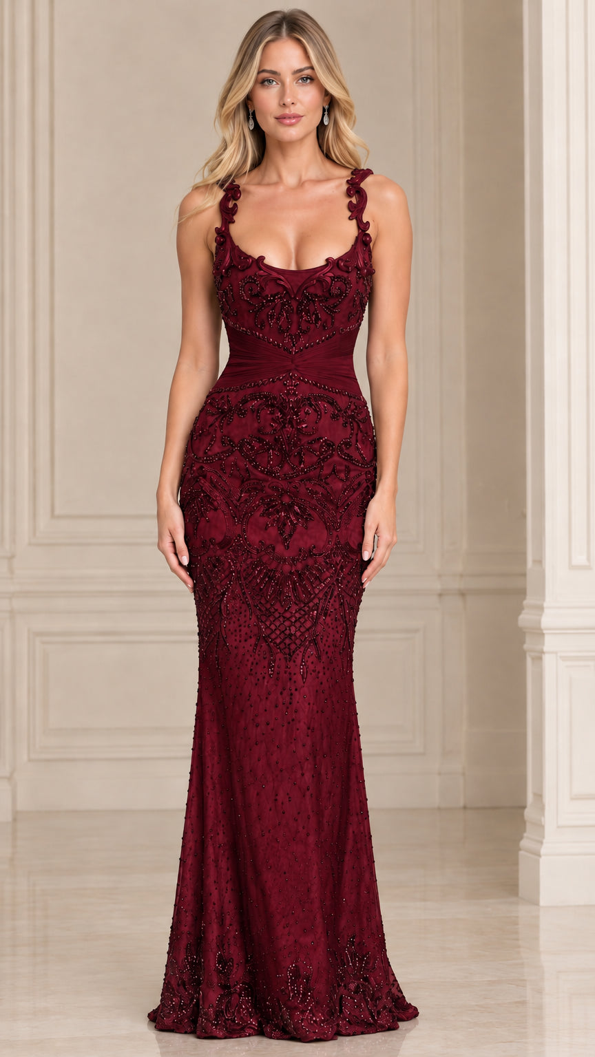 Model wearing burgundy red beaded scoop neck mermaid evening gown