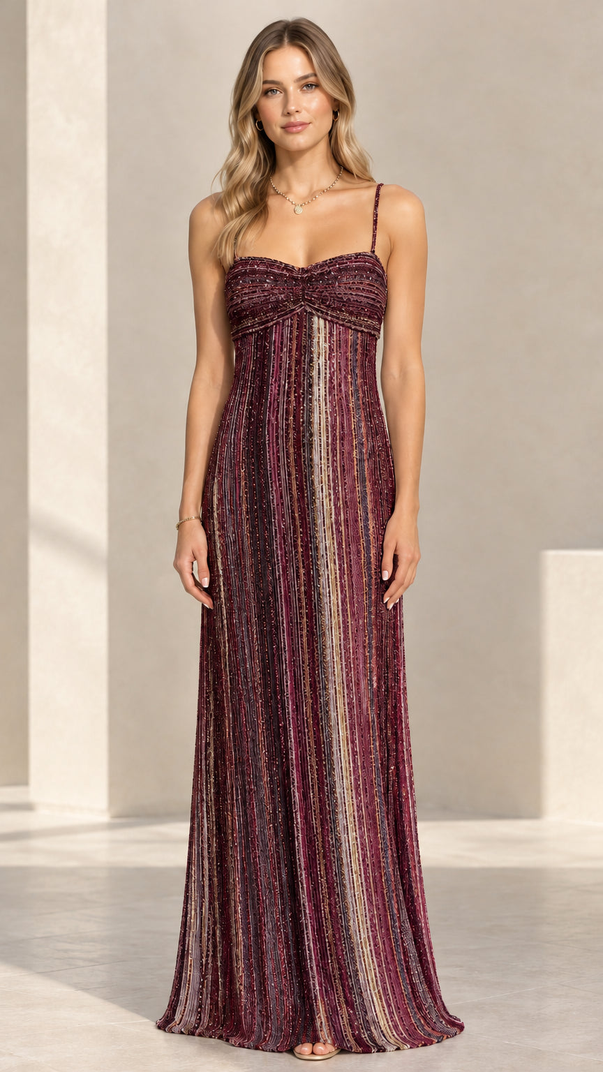 Model wearing the burgundy red multi metallic shimmer empire maxi gown