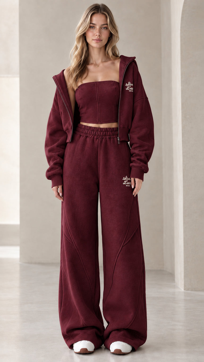 Full front view of model wearing the burgundy 3-piece fleece tracksuit set