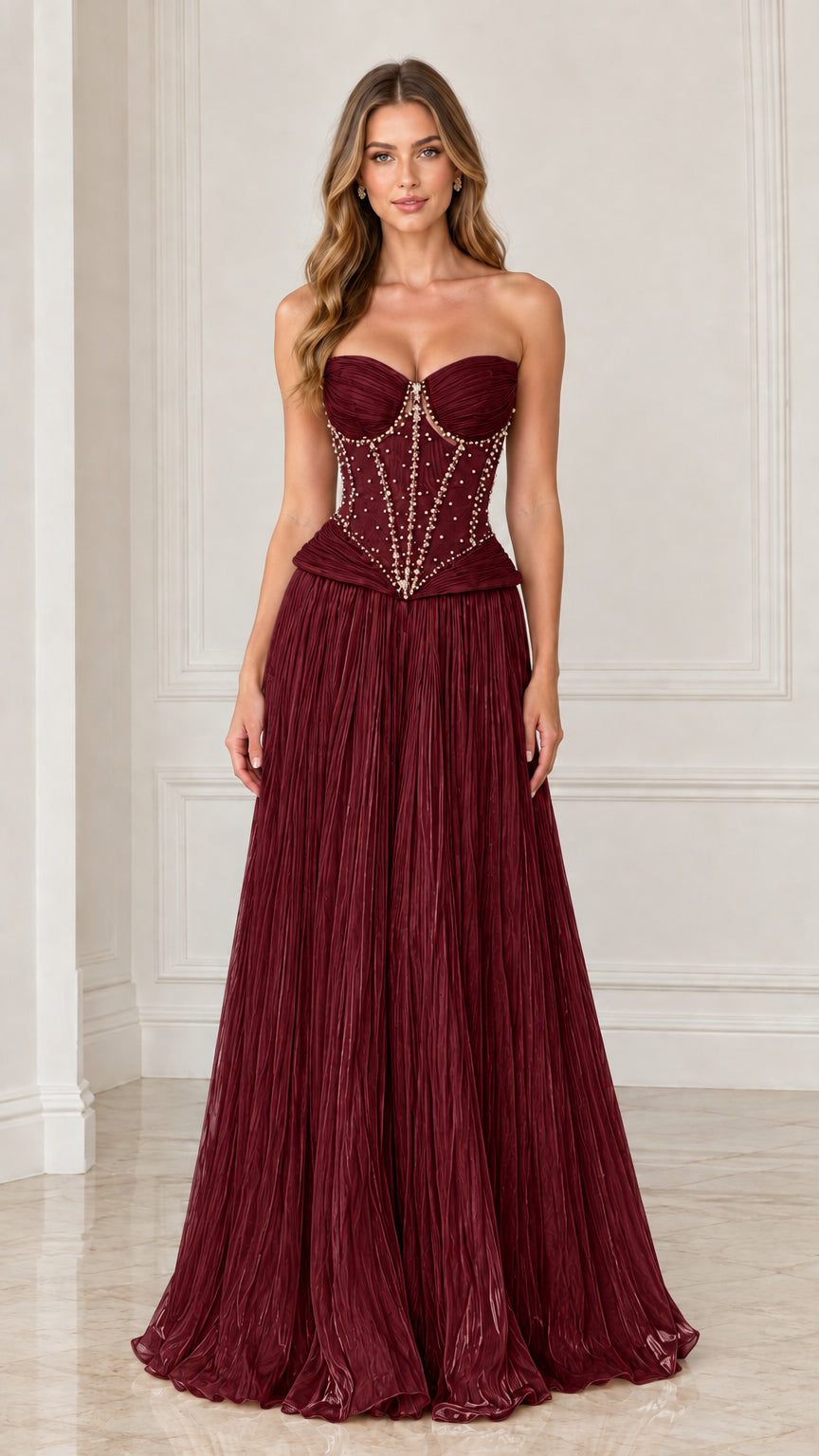 Front view of burgundy red strapless pearl-embellished evening gown