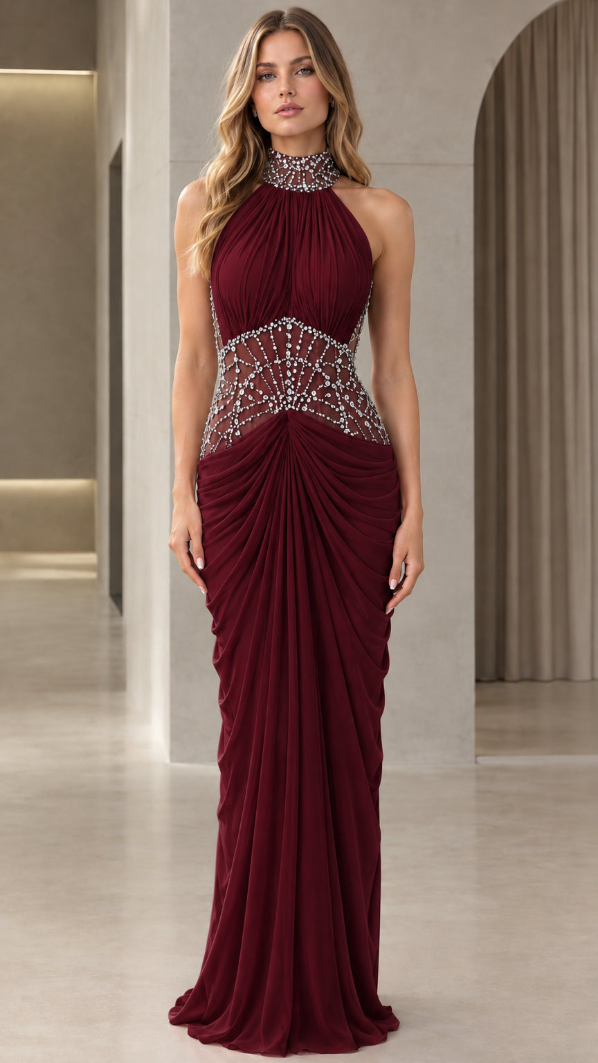 Front view of model wearing Burgundy halter neck crystal embellished evening gown