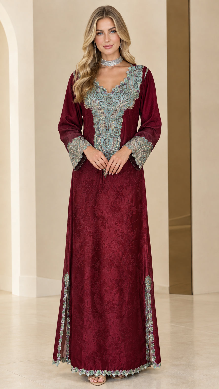 Front full-length view of woman in rich burgundy wine embroidered kaftan dress