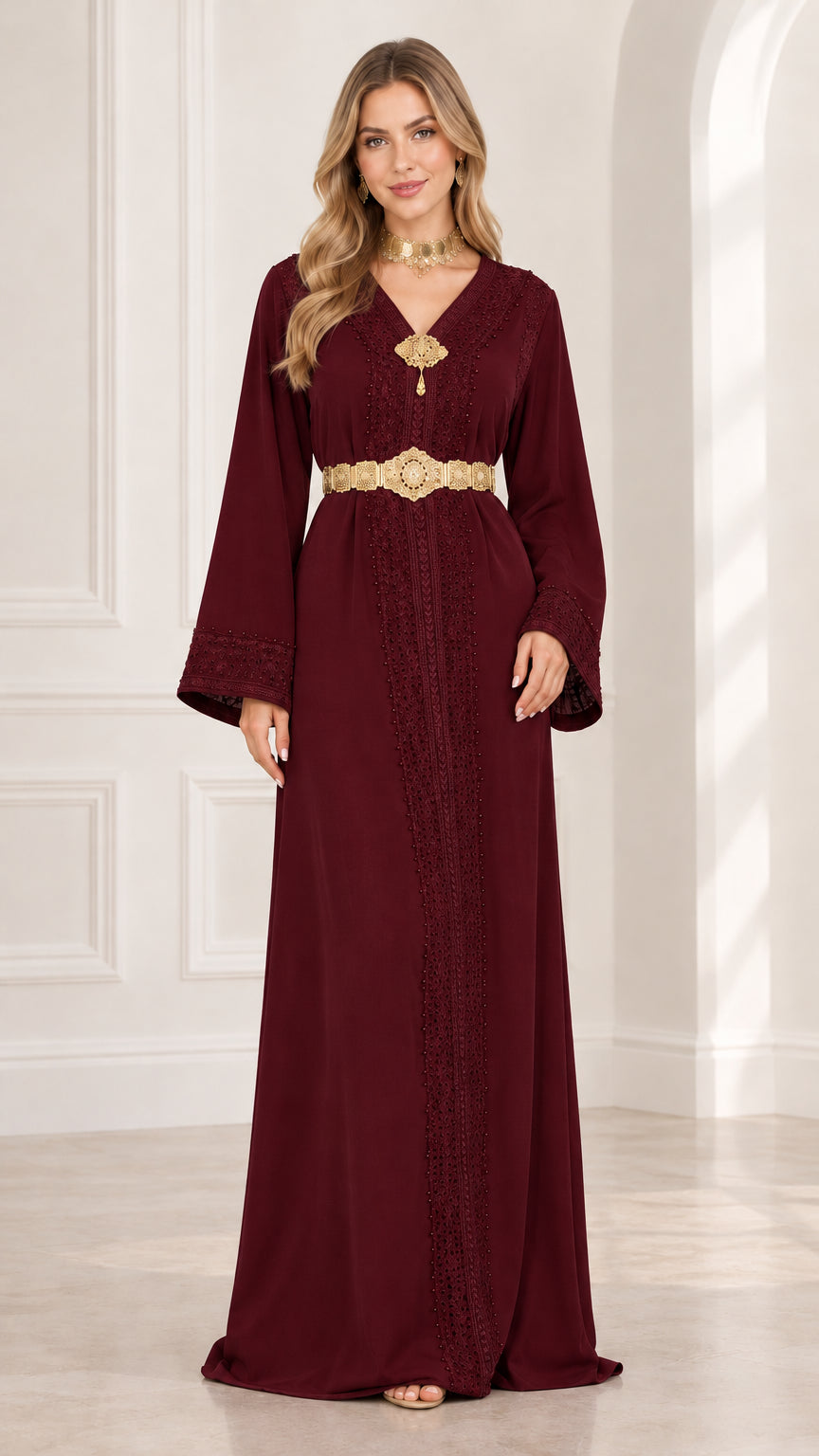 Front view of burgundy wine embellished kaftan maxi dress with gold belt