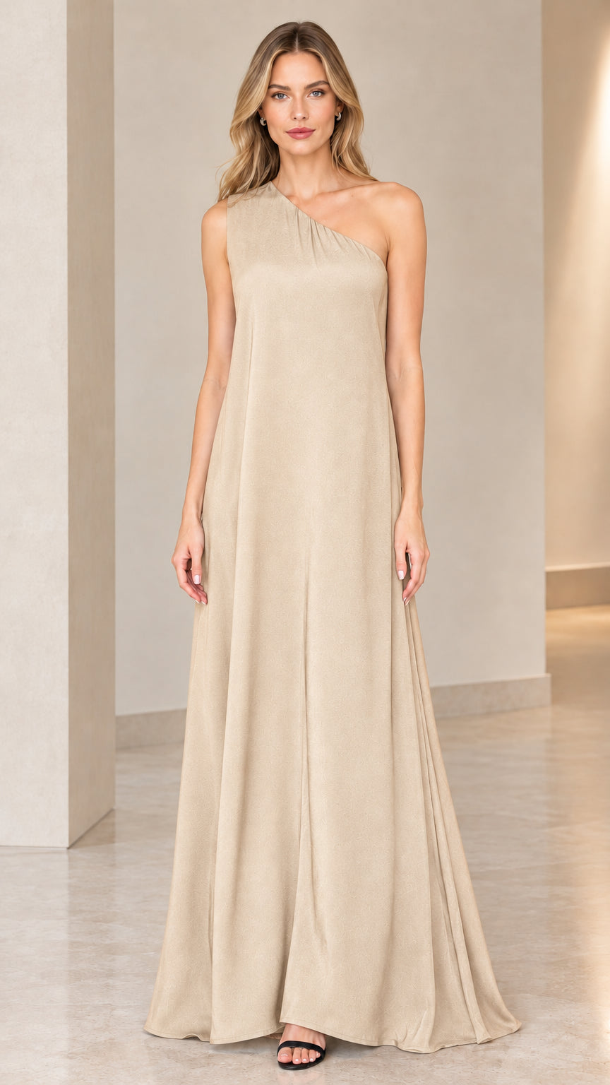 Front view of model wearing champagne beige one-shoulder maxi dress