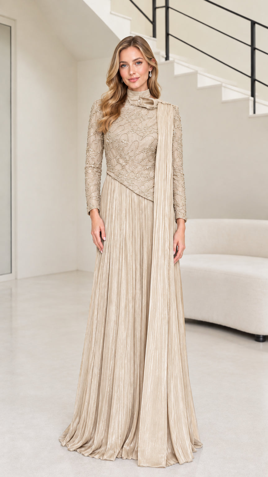 Front full-length view of champagne beige beaded long sleeve formal gown with pleated skirt