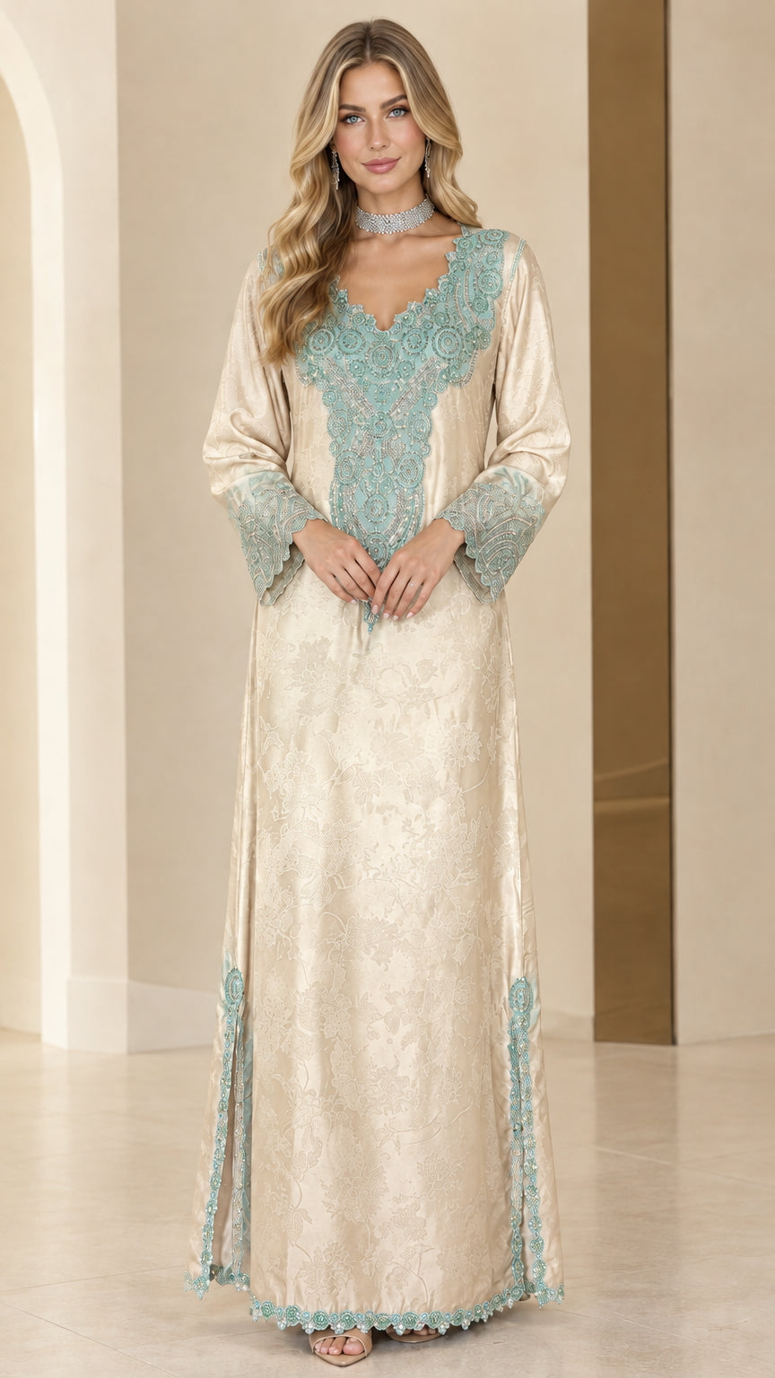 Front full-length view of woman in champagne gold embroidered kaftan maxi dress