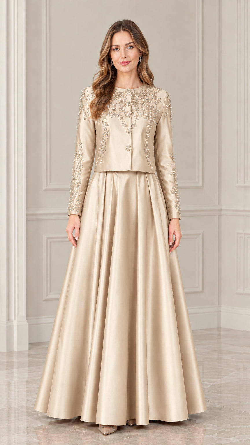 Model wearing champagne gold beaded formal jacket and floor-length skirt set