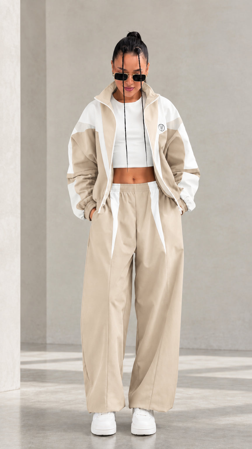 Model wearing Beige colorblock tracksuit set with white accents