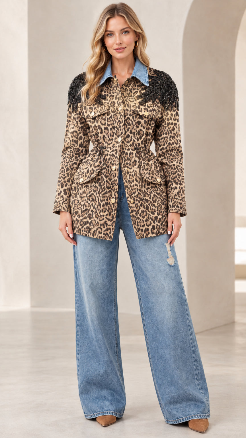 Model wearing tan leopard print utility jacket with denim collar