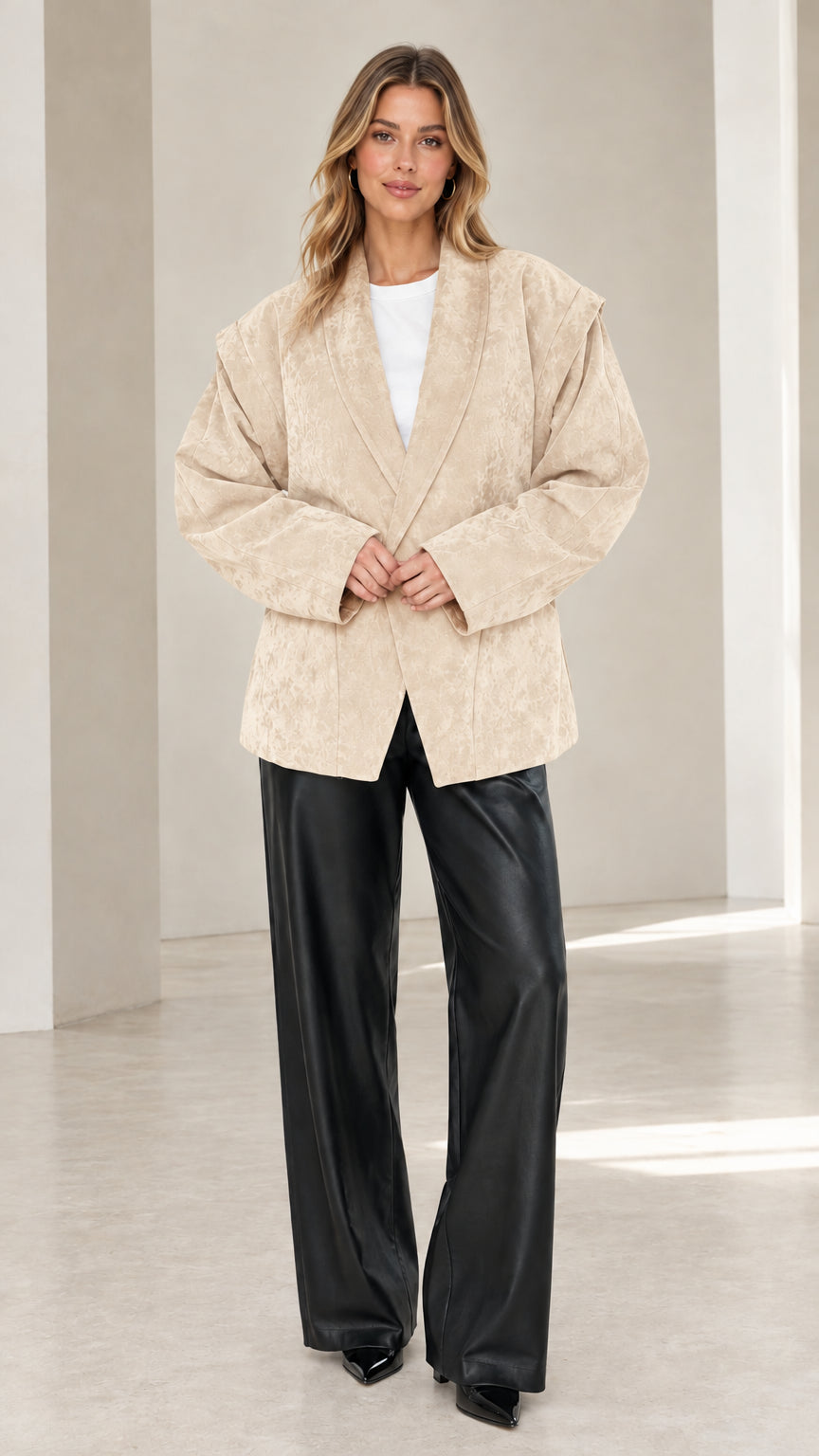 Front view of model wearing beige cream faux suede oversized tailored blazer