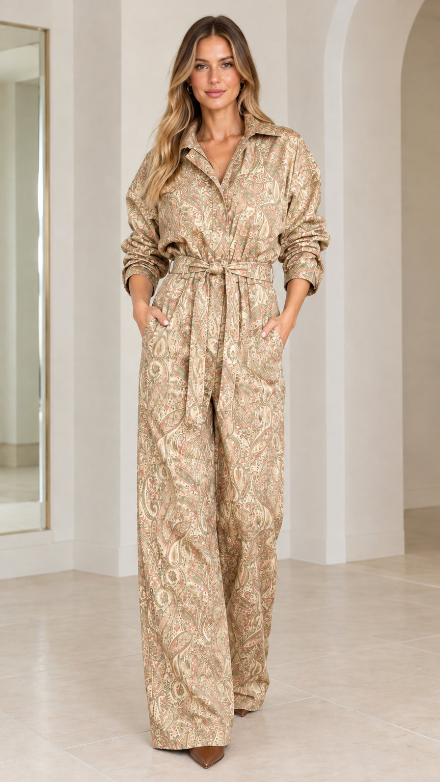Woman wearing beige and champagne paisley wide leg collared jumpsuit