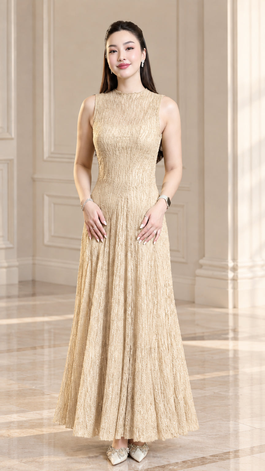 Front view of model wearing champagne beige sleeveless textured plissé maxi dress