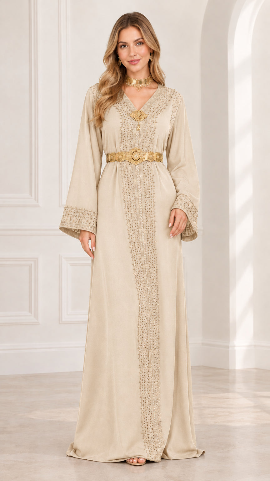 Front view of champagne beige embellished kaftan maxi dress with gold belt