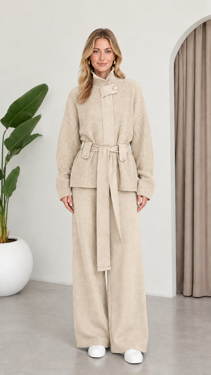 Full front view of model wearing the Beige ribbed knit belted two-piece set