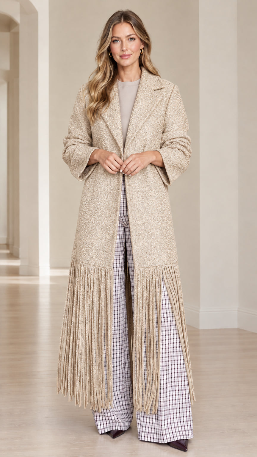 Model wearing Oatmeal beige textured bouclé fringe hem longline coat