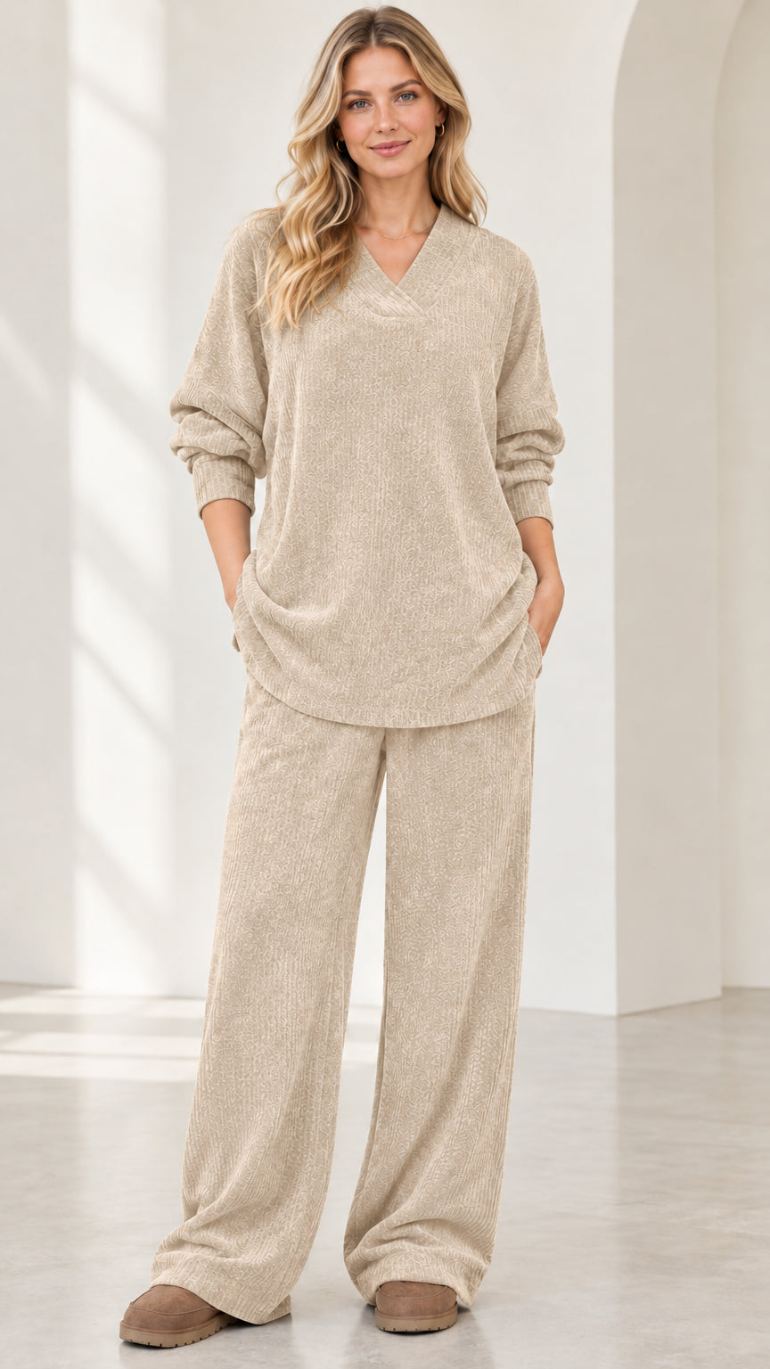 Front view of woman wearing beige oatmeal textured knit V-neck top and matching wide leg pants
