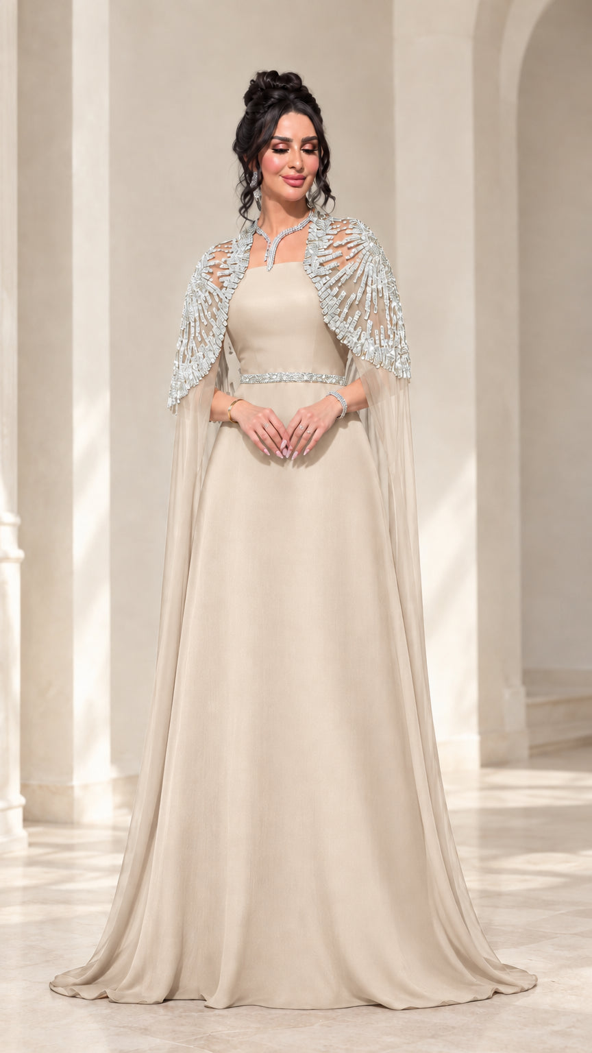 Champagne beige A-line formal gown with silver sequined cape overlay
